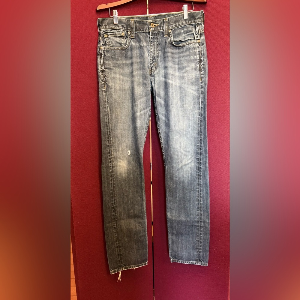 Levi's Light Blue Jeans with Pink Logo Patch